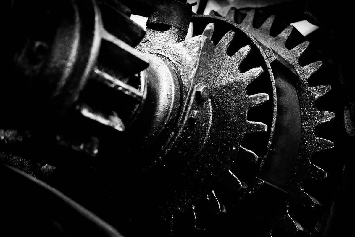 giant machine gears in black and white