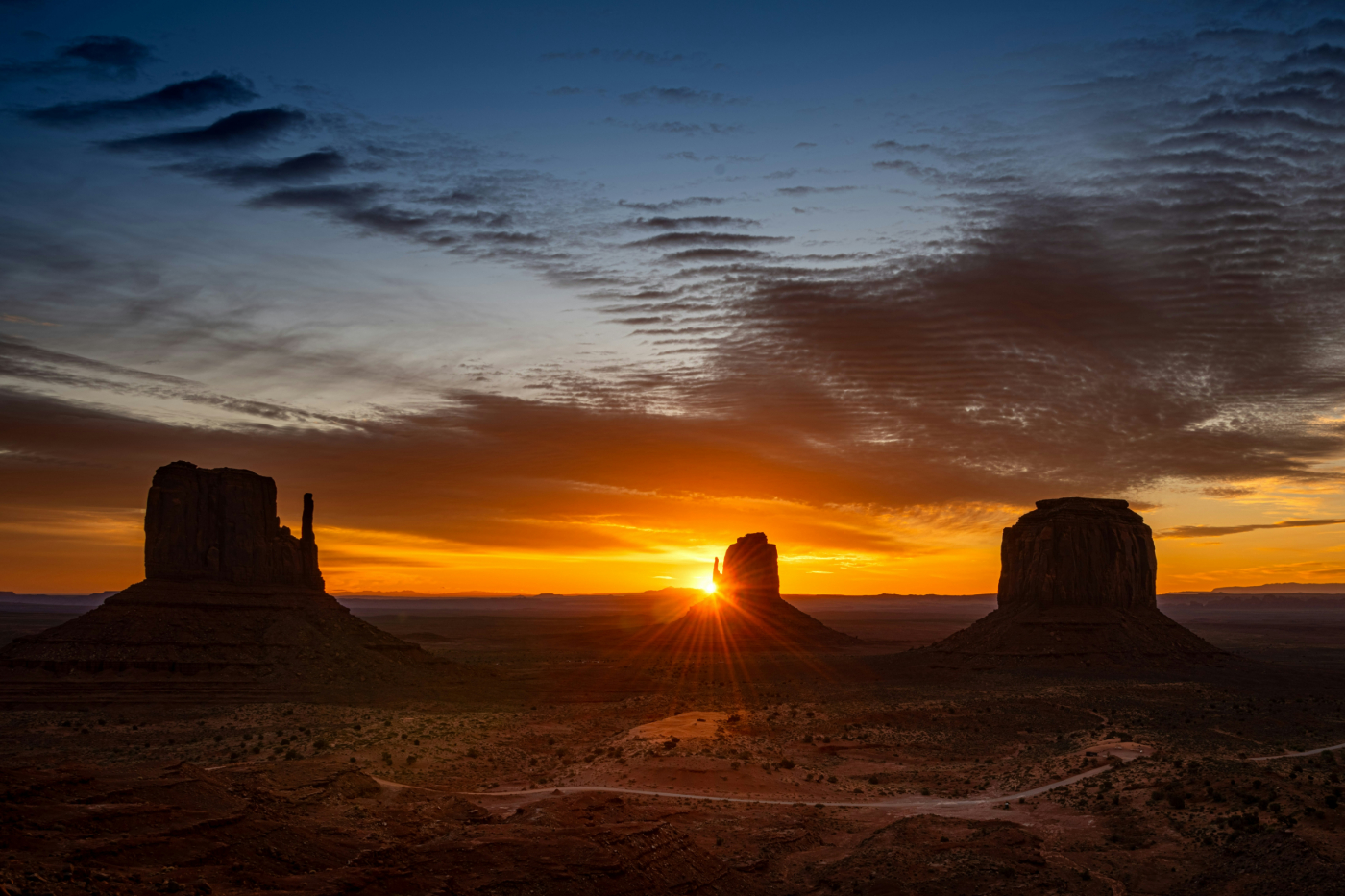 The sun setting on Monument Valley, Arizona