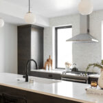 Inside the kitchen of a home by CW Urban
