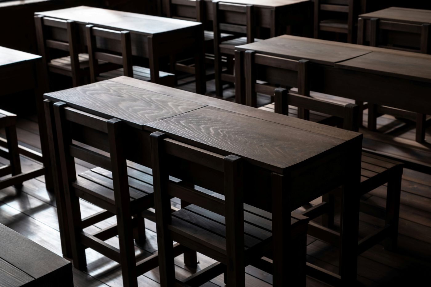 Brown wooden classroom desks