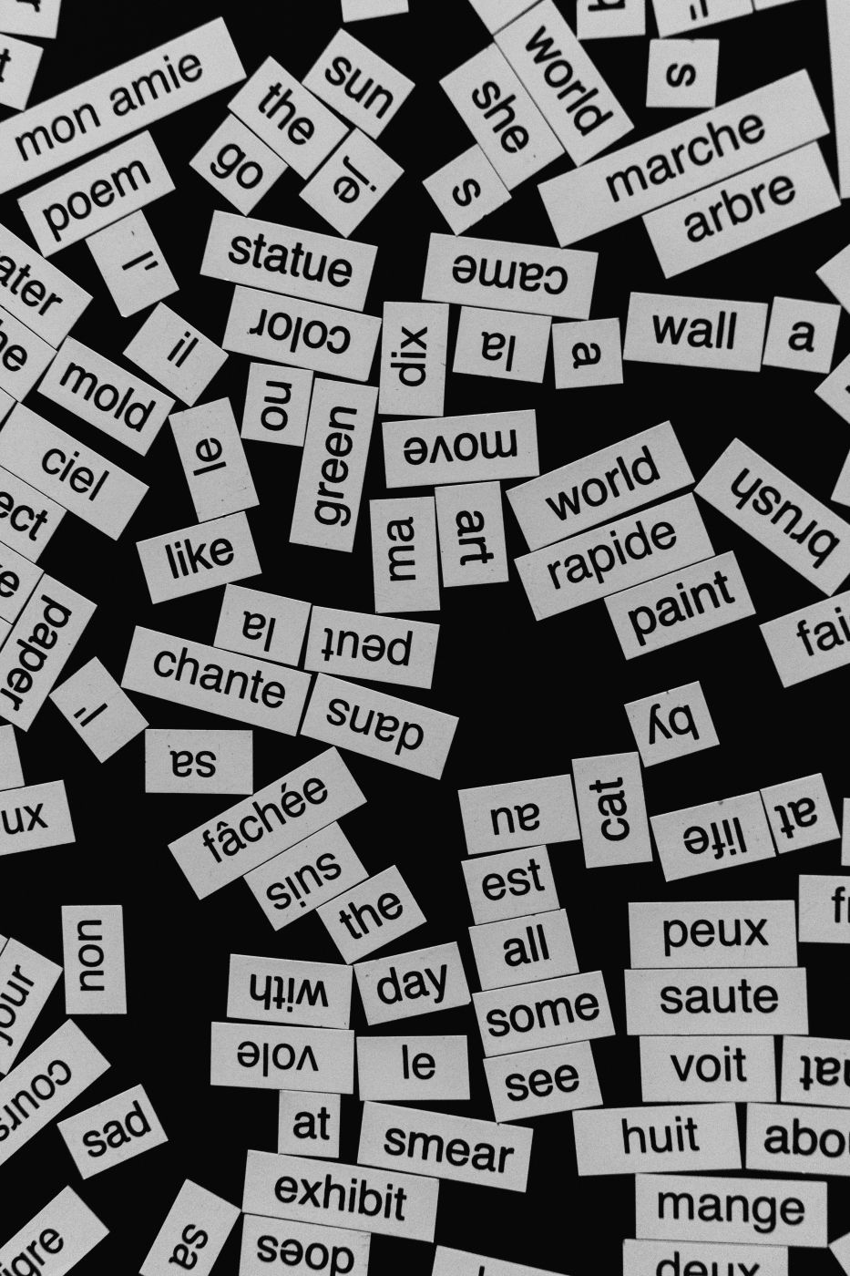 Many small magnets with a word on each